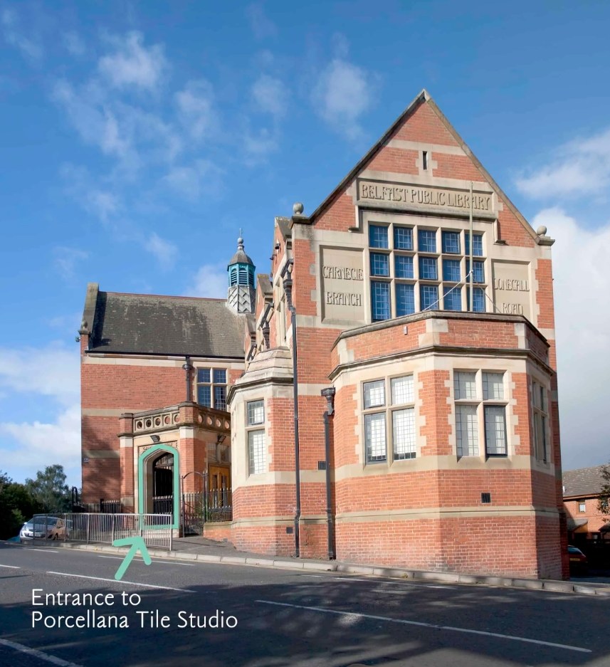 The red brick Carnegie Building on Donegall Road, with the entrance to Porcellana Tile Studio marked