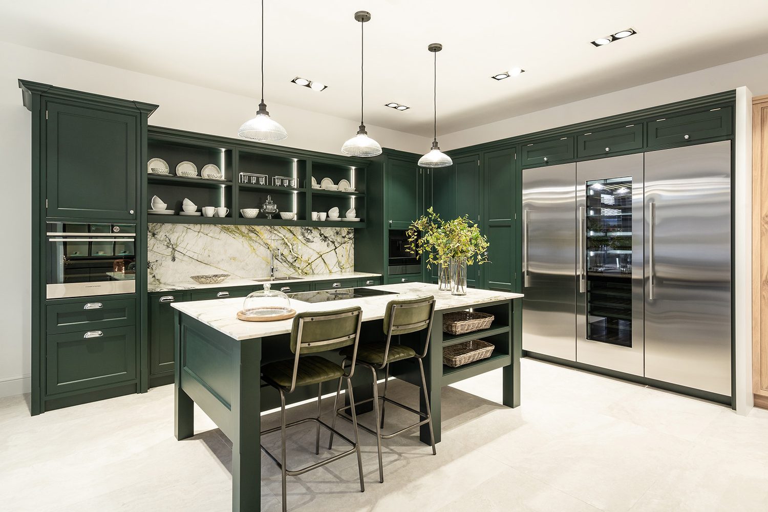 Green hand painted kitchen on Tuscan Travertine porcelain floor